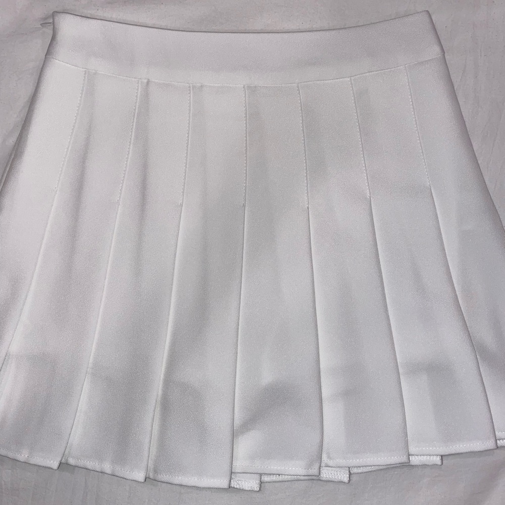 White pleated skirt